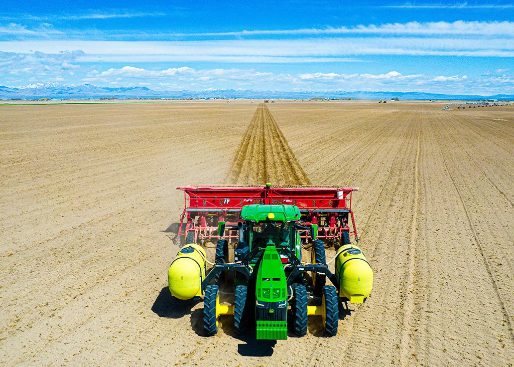 Potato planter in field