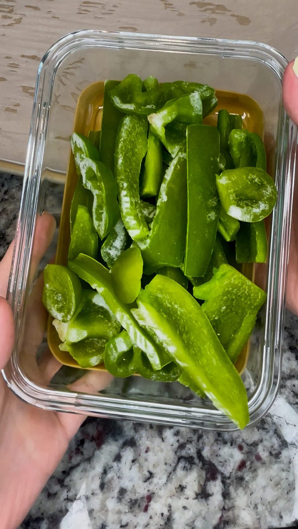 Flash freezes bell peppers in a storage container