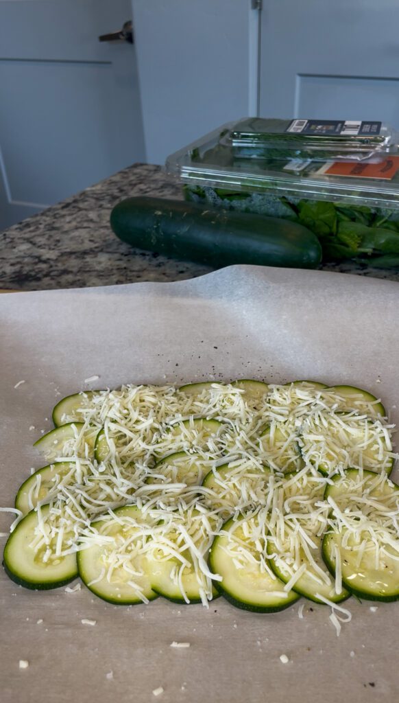 Cheese and olive oil on zucchini