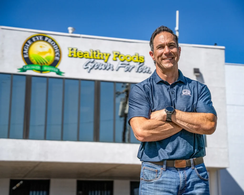 Joe Ange, Director of Onion Sales, standing in front of the Ontario onion facility