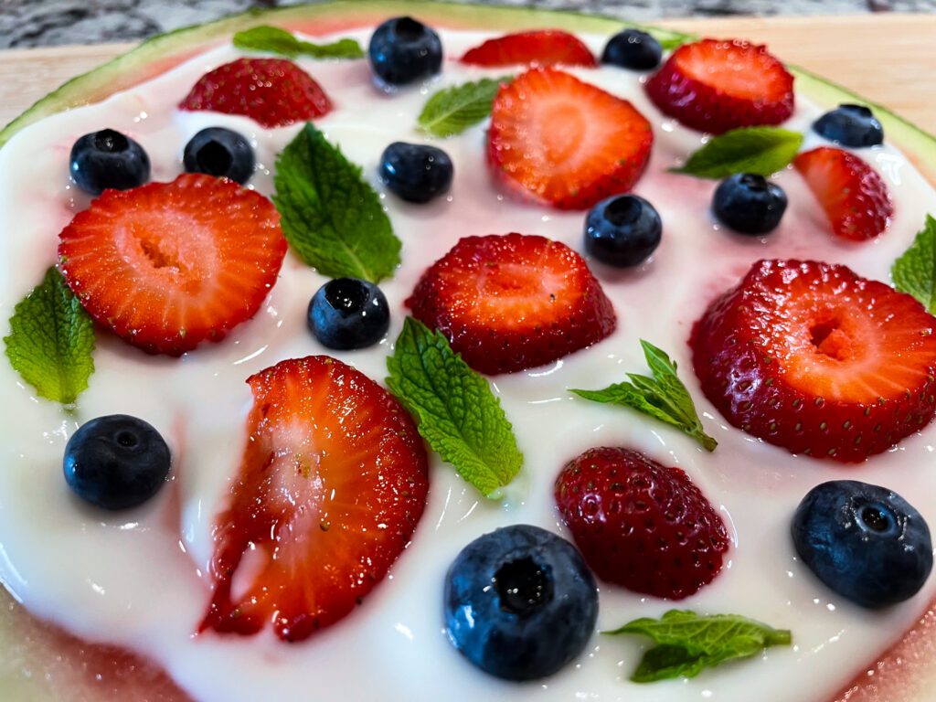Close up of fruit on watermelon pizza