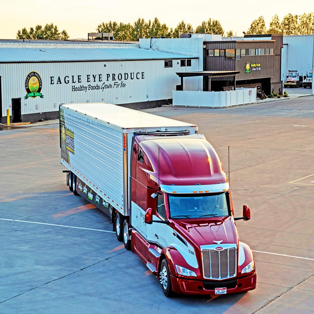 Eagle Eye Logistics truck in front of an Eagle Eye Produce warehouse